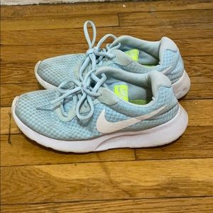 Light blue Nike Tanjuns